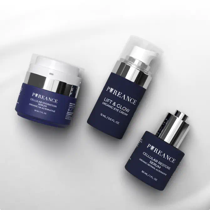 Three Pureance skincare products displayed on a soft white fabric background