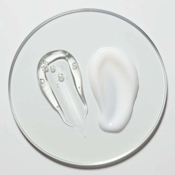 A close-up of two different textures on a white surface