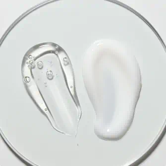 A close-up of two different textures on a white surface