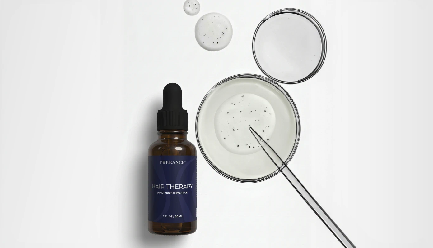 Pureance Hair Therapy Scalp Nourishment Oil beside lab equipment on a clean white surface